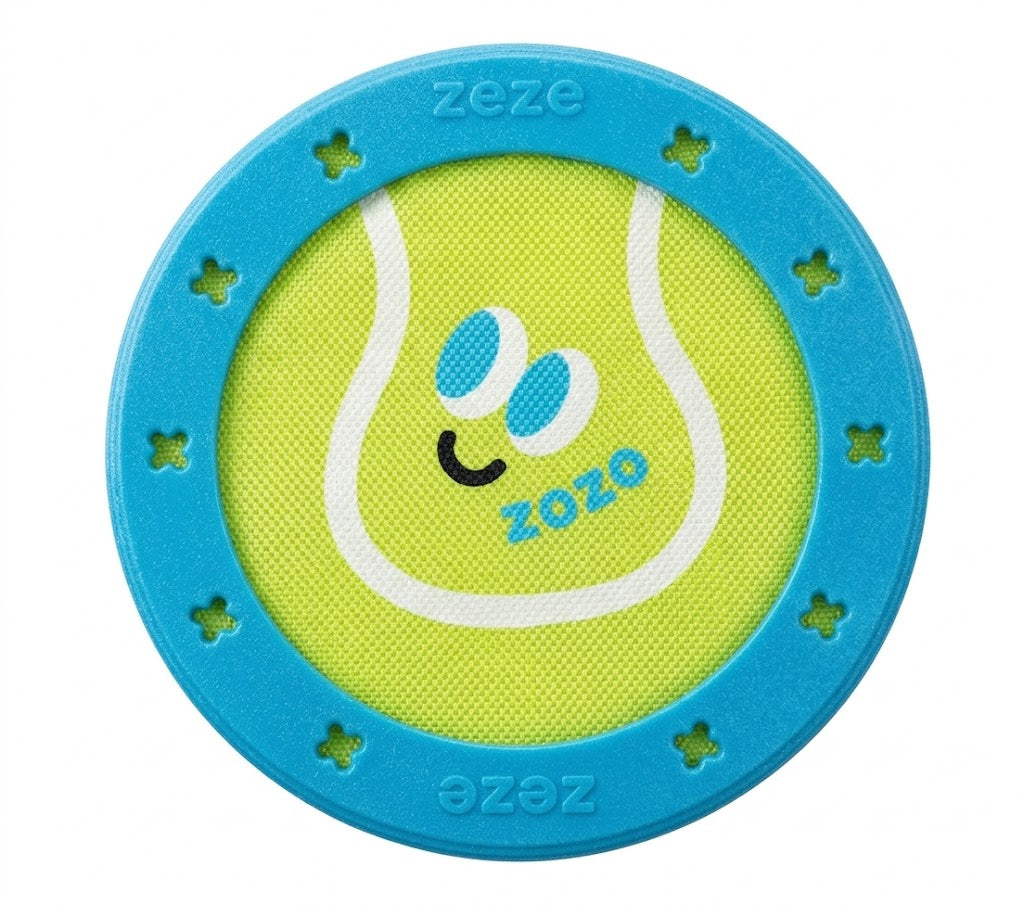 Round green toy with blue border featuring 'zeze' branding on a white background