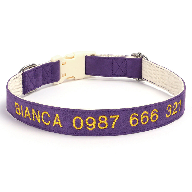 Purple dog collar with yellow text on a white background